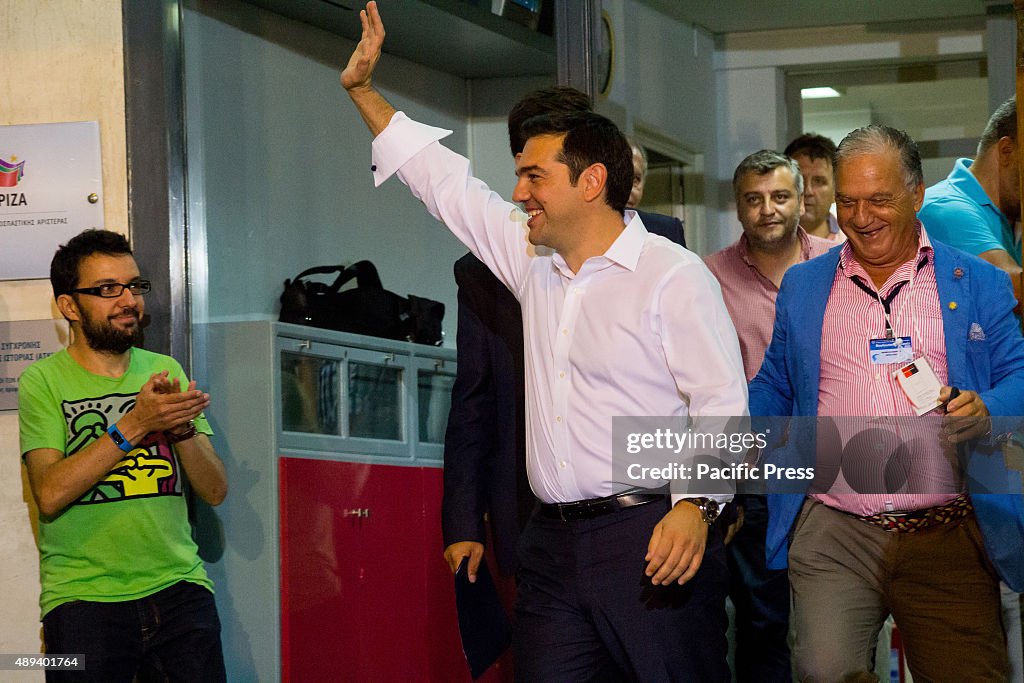 Syriza leader Alexis Tsipras exits the party's headquarters...