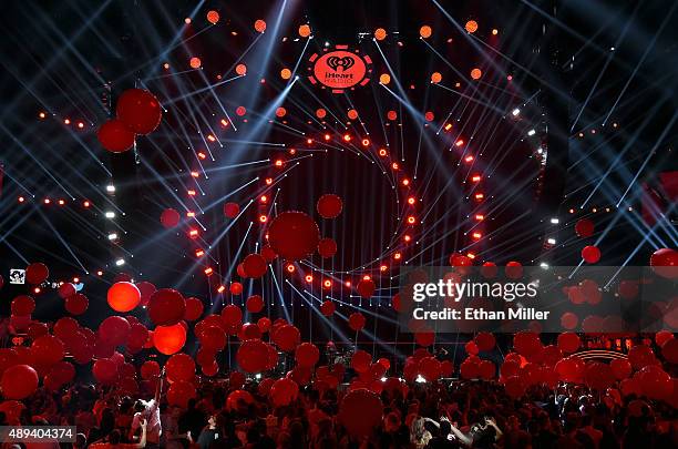 Balloons fall on the crowd after a performance by Fall Out Boy at the 2015 iHeartRadio Music Festival at MGM Grand Garden Arena on September 19, 2015...