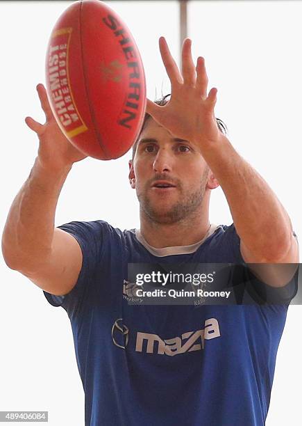 Jarrad Waite of the Kangaroos marks during a North Melbourne Kangaroos AFL media session at Arden Street Ground on September 21, 2015 in Melbourne,...