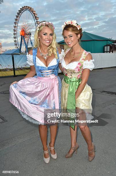 Denise Cotte and Jessica Kuehne attend the Almauftrieb during the Oktoberfest 2015 at Kaefer Tent on September 20, 2015 in Munich, Germany.