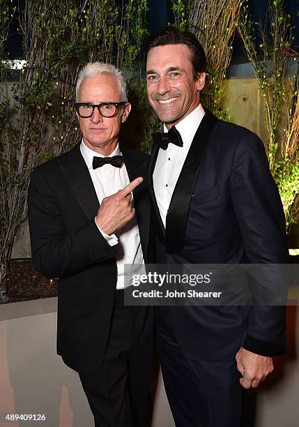 Actors John Slattery and Jon Hamm attend the AMC, BBC America, IFC And SundanceTV Emmy After Party at BOA Steakhouse on September 20, 2015 in West...