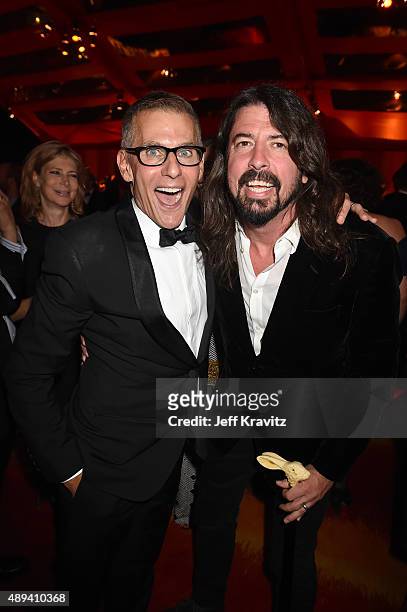 President of Programming Michael Lombardo and musician Dave Grohl attend HBO's Official 2015 Emmy After Party at The Plaza at the Pacific Design...