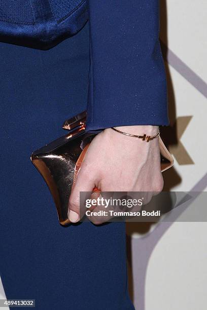 Actress Skyler Samuels, handbag detail, attends the 67th Primetime Emmy Awards Fox after party on September 20, 2015 in Los Angeles, California.