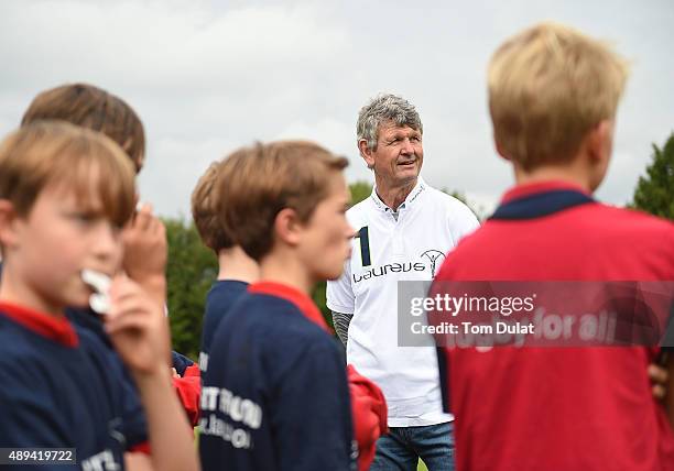 Laureus Academy Member Morne du Plessis takes part in activites during the Laureus Rugby Project Visit at Dulwich Common on September 21, 2015 in...