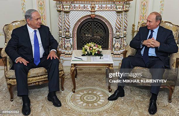 Russian President Vladimir Putin meets with Israeli Prime Minister Benjamin Netanyahu at the Novo-Ogaryovo residence, outside Moscow, on September...