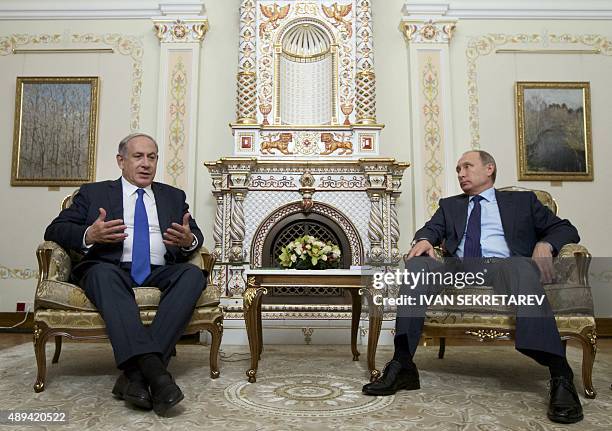 Russian President Vladimir Putin meets with Israeli Prime Minister Benjamin Netanyahu at the Novo-Ogaryovo residence, outside Moscow, on September...