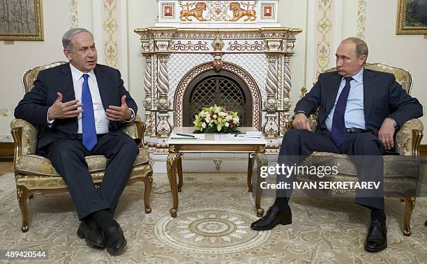 Russian President Vladimir Putin meets with Israeli Prime Minister Benjamin Netanyahu at the Novo-Ogaryovo residence, outside Moscow, on September...
