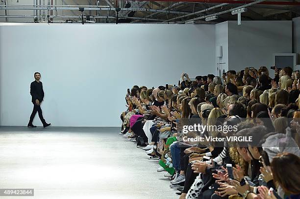 Fashion designer David Koma walks the runway of the David Koma Ready to Wear show during London Fashion Week Spring/Summer 2016/17 on September 20,...