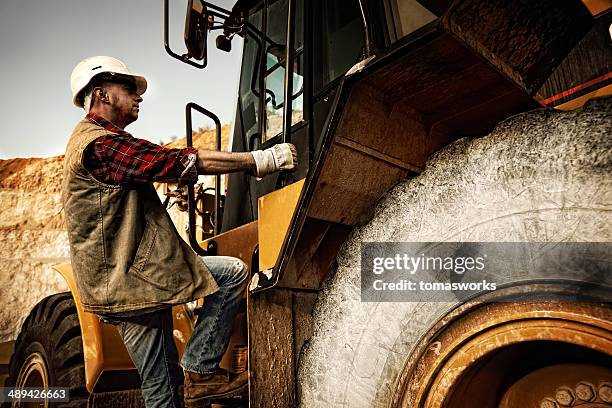 bulldozer operator - mining worker stock pictures, royalty-free photos & images