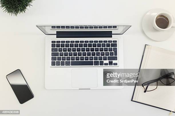 place of work - mac laptop stock pictures, royalty-free photos & images