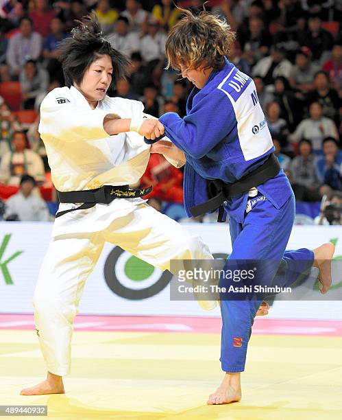 Misato Nakamura of Japan and Urantsetseg Munkhbat of Mongolia compete in the Women's Team semi final during the 2015 Astana World Judo Championships...