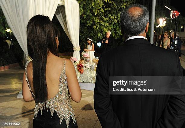 Iranian families take part in a luxury wedding with mixed dancing and removal of headscarves, at a private garden tailor-made for the purpose west of...