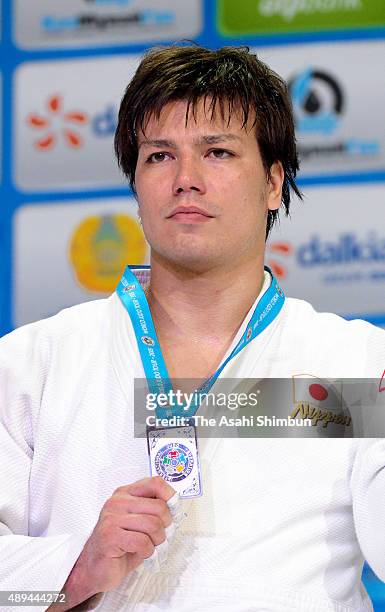 Silver medalist Ryu Shichinohe is seen on the podium at the medal ceremony for the Men's +100kg during the 2015 Astana World Judo Championships at...