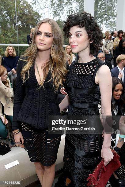 Cara Delevingne and Annie Clark attend the Burberry show during London Fashion Week Spring/Summer 2016 on September 21, 2015 in London, England.