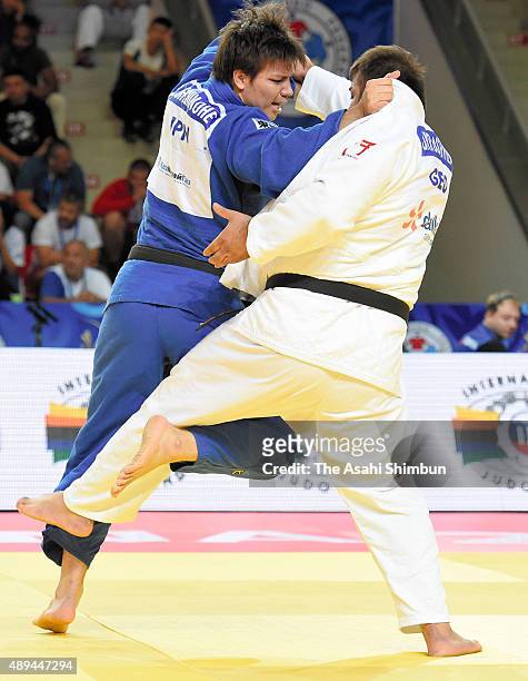 Ryu Shichinohe of Japan and Adam Okruashvili of Georgia compete in the Men's +100kg semifinal during the 2015 Astana World Judo Championships at the...