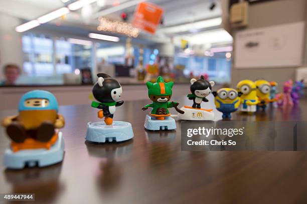 Chicago, IL - JULY 20, 2015 Some of the Happy Meal toys developed specifically for the Canadian Market include toy Zambonis and Vancouver 2010...