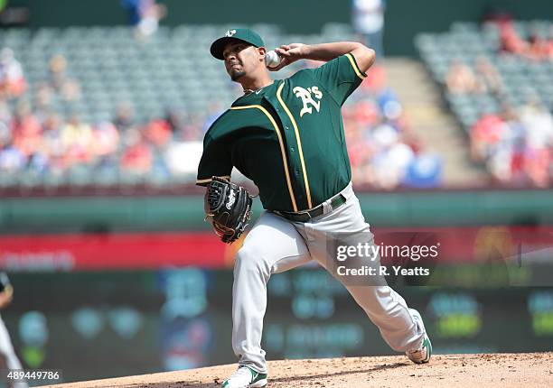 Felix Doubront of the Oakland Athletics throws in the first inning against the Texas Rangers at Global Life Park in Arlington on September 13, 2015...