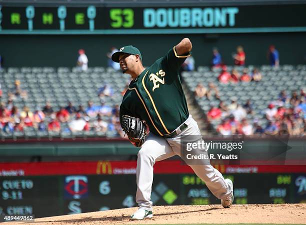 Felix Doubront of the Oakland Athletics throws in the first inning against the Texas Rangers at Global Life Park in Arlington on September 13, 2015...