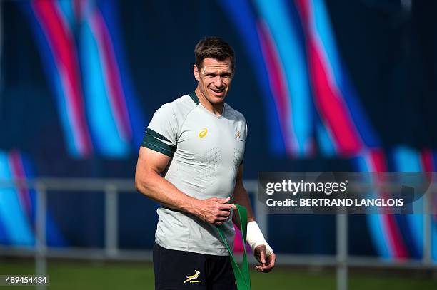 South Africa's captain and centre Jean de Villiers takes part a training session in Birmingham on September 21 after losing against Japan in their...