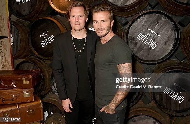 Geremy Jasper and David Beckham attend the premiere for Belstaff FilmsÕ Outlaws' during London Fashion Week at La Bodega Negra on September 21, 2015...