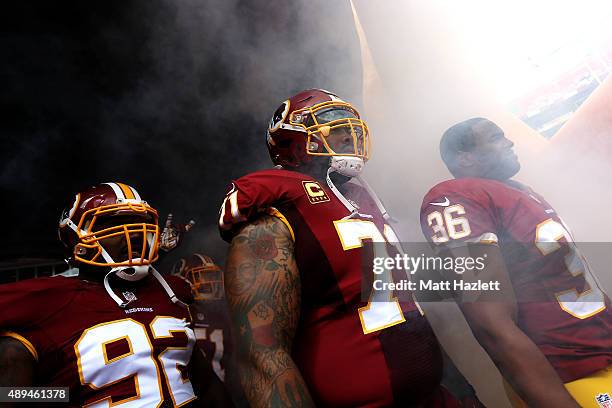 Defensive back Tanard Jackson of the Washington Redskins, nose tackle Chris Baker of the Washington Redskins, inside linebacker Will Compton of the...