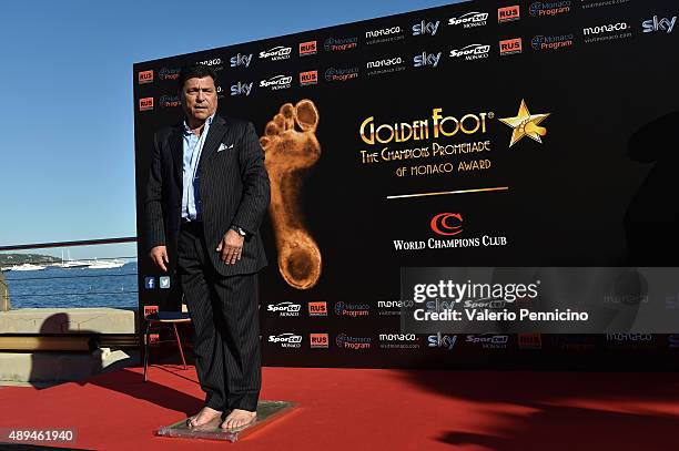 Daniel Passarella leaves his footprints during the Golden Foot award ceremony at Fairmont Hotel on September 21, 2015 in Monaco, Monaco.