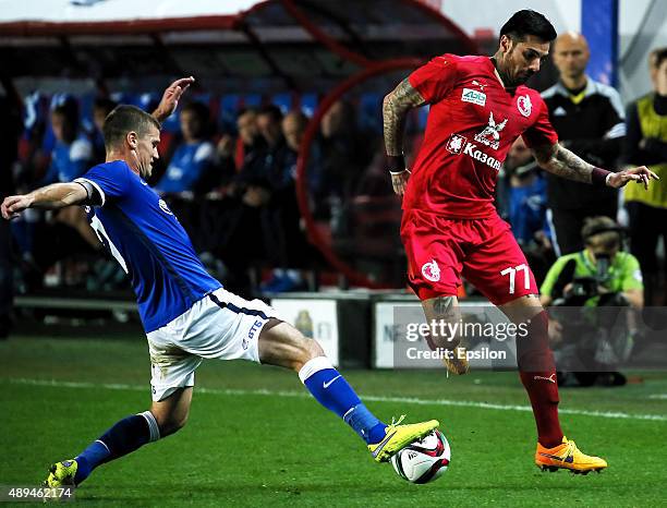 Igor Denisov of FC Dinamo Moscow is challenged by Blagoy Georgiev of FC Rubin Kazan during the Russian Premier League match between Dinamo Moscow and...