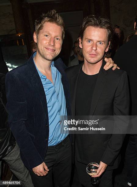 Christopher Kane and Christopher Bailey attend the Business Of Fashion 500 Gala Dinner during London Fashion Week Spring/Summer 2016 on September 21,...