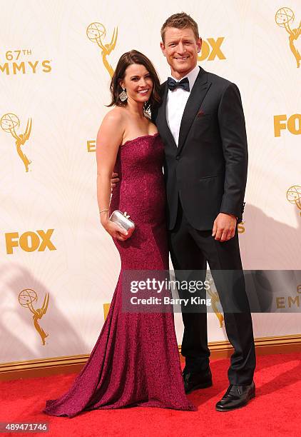 Megan Marie Coughlin and actor Philip Winchester arrive at the 67th Annual Primetime Emmy Awards at the Microsoft Theater on September 20, 2015 in...