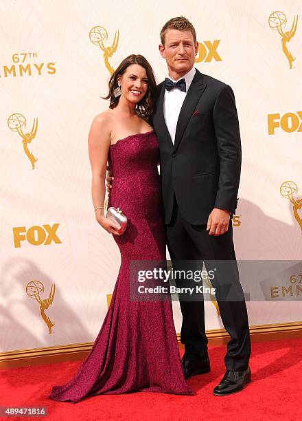Megan Marie Coughlin and actor Philip Winchester arrive at the 67th Annual Primetime Emmy Awards at the Microsoft Theater on September 20, 2015 in...