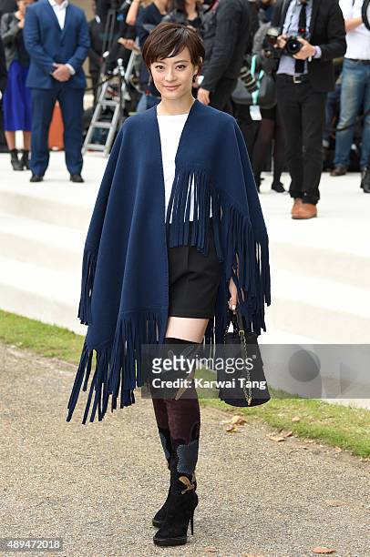Sun Li attends the Burberry Prorsum show during London Fashion Week Spring/Summer 2016/17 at Kensington Gardens on September 21, 2015 in London,...