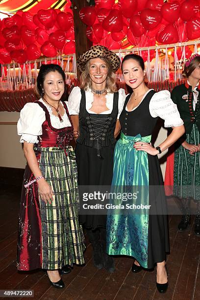 Ankie Lau and her daughter Ankie Beilke, Nathalie Weidenfeld attend the Regines Sixt Damen Wiesn during the Oktoberfest 2015 on September 21, 2015 in...
