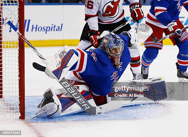 Antti Raanta of the New York Rangers makes a save against the New Jersey Devils during their Pre Season game at Madison Square Garden on September...