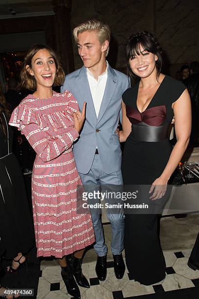 Alexa Chung, Lucky Blue Smith and Daisy Lowe attend the Business Of Fashion 500 Gala Dinner during London Fashion Week Spring/Summer 2016 on...