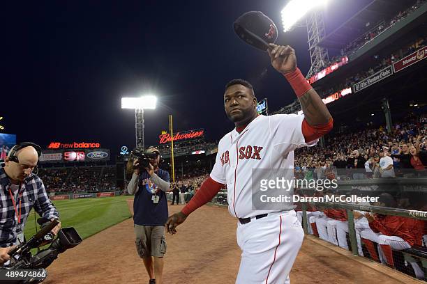 David Ortiz of the Boston Red Sox walks out to acknowledge the crowd during a ceremony to honor his 500th home run hit last week in an away game at...