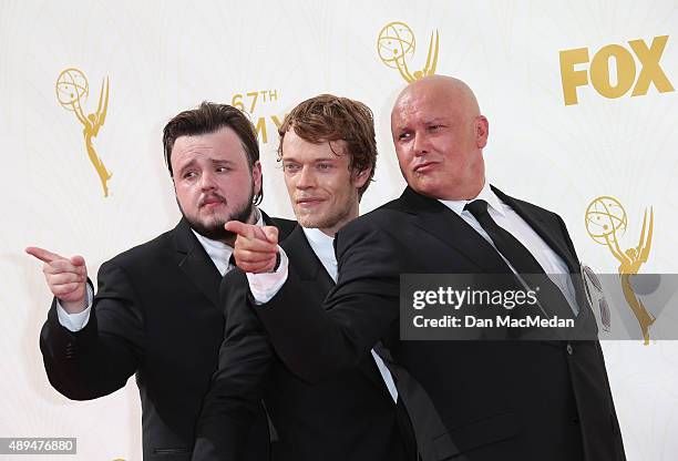 John Bradley-West, Alfie Allen, and Conleth Hill arrive at the 67th Annual Primetime Emmy Awards at the Microsoft Theater on September 20, 2015 in...