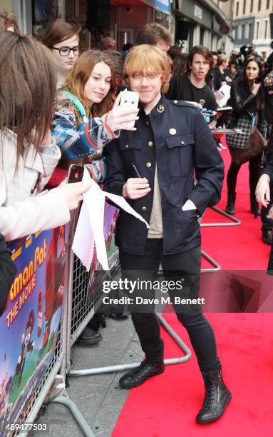 Rupert Grint attends the World Premiere of "Postman Pat" at Odeon West End on May 11, 2014 in London, England.