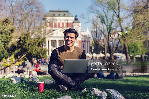 young man using lap top - sofia stock pictures, royalty-free photos & images