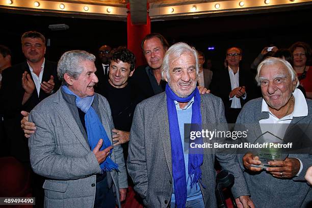Claude Lelouch, Patrick Bruel, Michel Leeb, Jean-Paul Belmondo, who receives an Award, and Charles Gerard attend the 'Trophees du Bien-Etre' by...