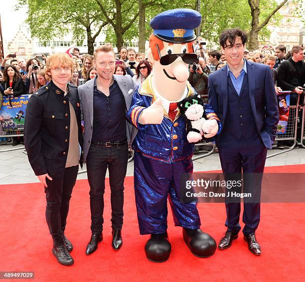 Rupert Grint, Ronan Keating and Stephen Mangan attend the UK premiere of 'Postman Pat' at the Odeon West End on May 11, 2014 in London, England.