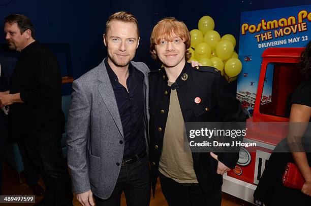 Ronan Keating and Rupert Grint attend the UK premiere of 'Postman Pat' at the Odeon West End on May 11, 2014 in London, England.