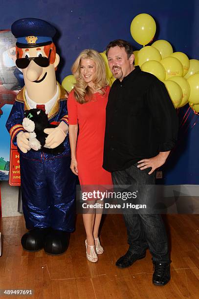 Sarah Beeny and Mike Disa attends the UK premiere of 'Postman Pat' at the Odeon West End on May 11, 2014 in London, England.