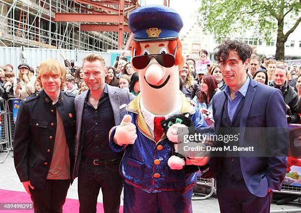 Rupert Grint, Ronan Keating, Postman Pat and Stephen Mangan attend the World Premiere of "Postman Pat" at Odeon West End on May 11, 2014 in London,...