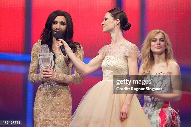 Winner of 2014 Eurovision Song Contest Conchita Wurst of Austria, hostess Lise Ronne and the winner of Eurovision Song Contest 2013 Emmelie de Forest...