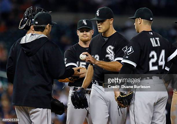 Dan Jennings of the Chicago White Sox is pulled from the game by manager Robin Ventura as catcher Rob Brantly, third baseman Gordon Beckham and first...