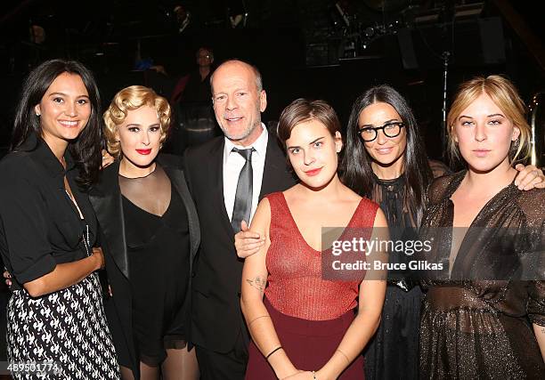 Emma Heming, Rumer Willis, father Bruce Willis, sister Tallulah Belle Willis, mother Demi Moore and sister Scout LaRue Willis pose backstage as Rumer...