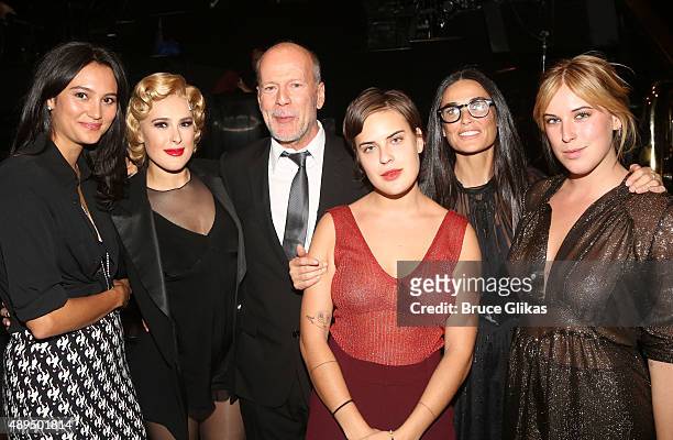 Emma Heming, Rumer Willis, father Bruce Willis, sister Tallulah Belle Willis, mother Demi Moore and sister Scout LaRue Willis pose backstage as Rumer...