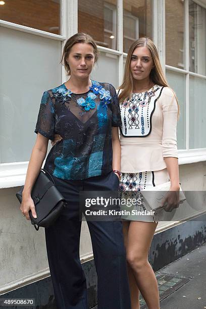 Super Model Yasmin Le Bon wears Celine trousers, Preen top and Christopher Kane bag. With model Amber Le Bon who wears Peter Pilotto top and skirt,...