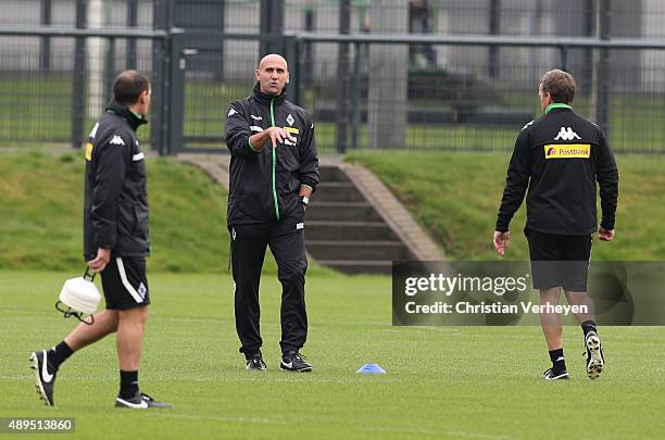 Co- Trainer Manfred Stefes, Head Coach Andre Schubert and Co- Trainer Frank Geideck of Borussia Moenchengladbach during a training session at...