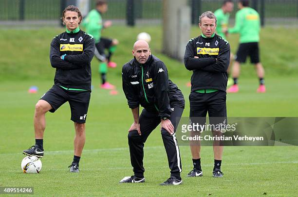 Athletic Coach Klaus Luisser, Head Coach Andre Schubert and Co- Trainer Frank Geideck of Borussia Moenchengladbach during a training session at...